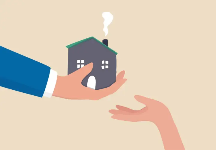 Une main tend une maison, symbolisant le droit viager au logement, à une autre main ouverte.