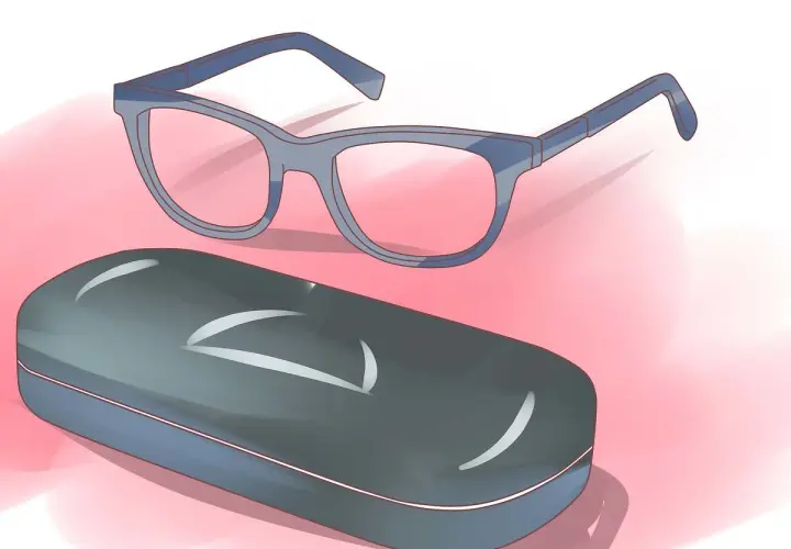 Lunettes mal faites, quel recours ? Une paire de lunettes bleues et son étui gris sur fond rose.