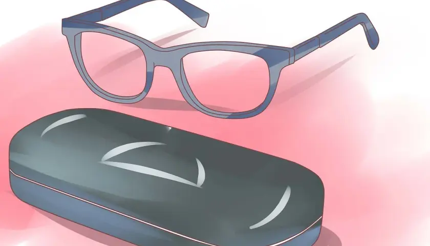 Lunettes mal faites, quel recours ? Une paire de lunettes bleues et son étui gris sur fond rose.